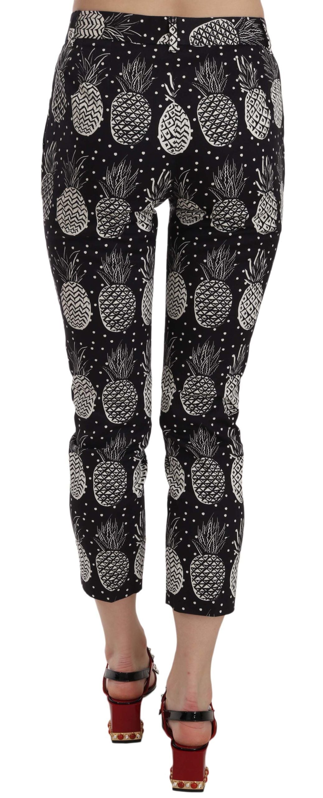 Dolce & Gabbana – Enge Caprihose mit schwarzem Ananas-Print