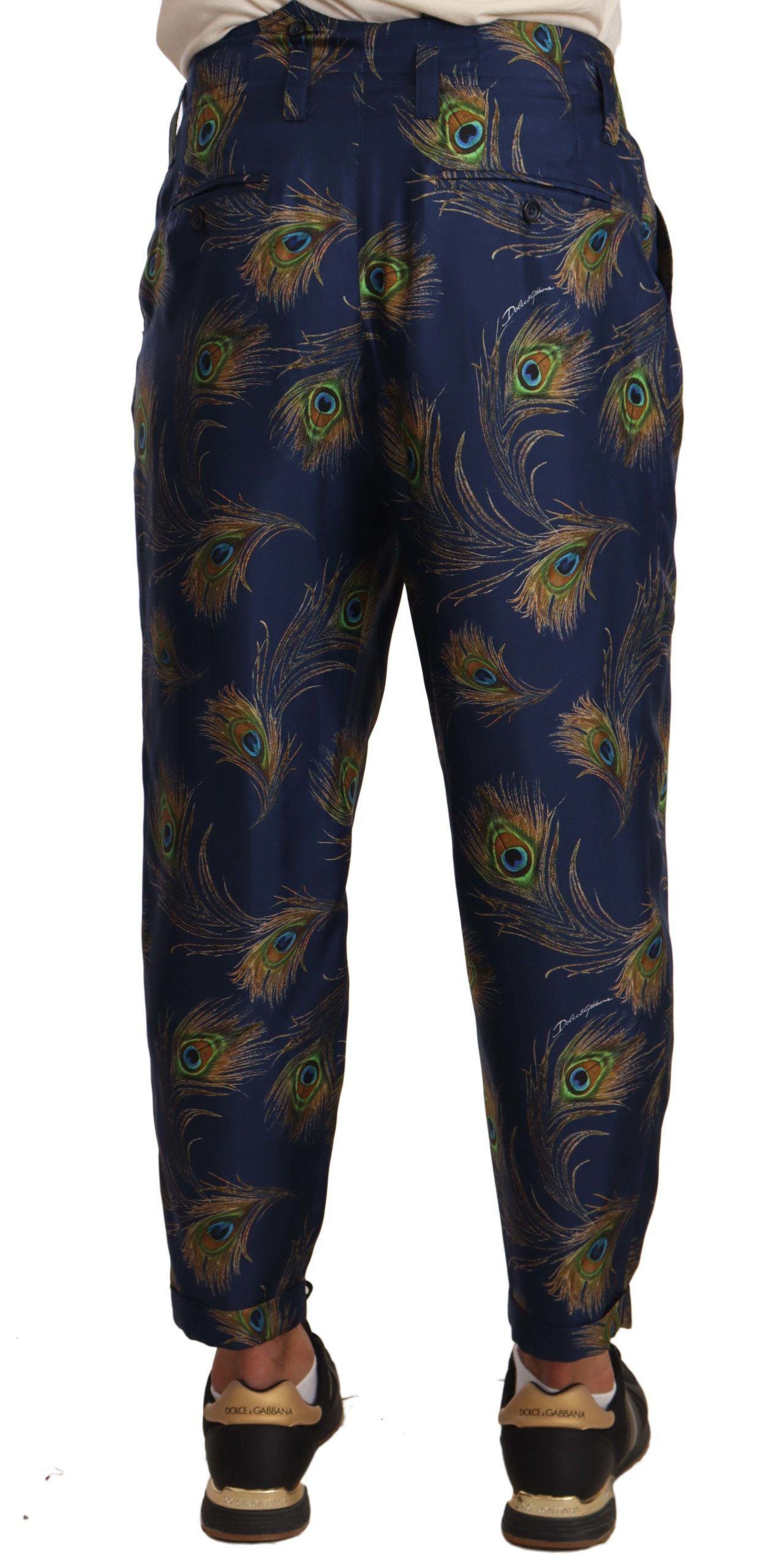 Dolce & Gabbana – Karottenhose aus Seide mit blauem Pfauenmuster