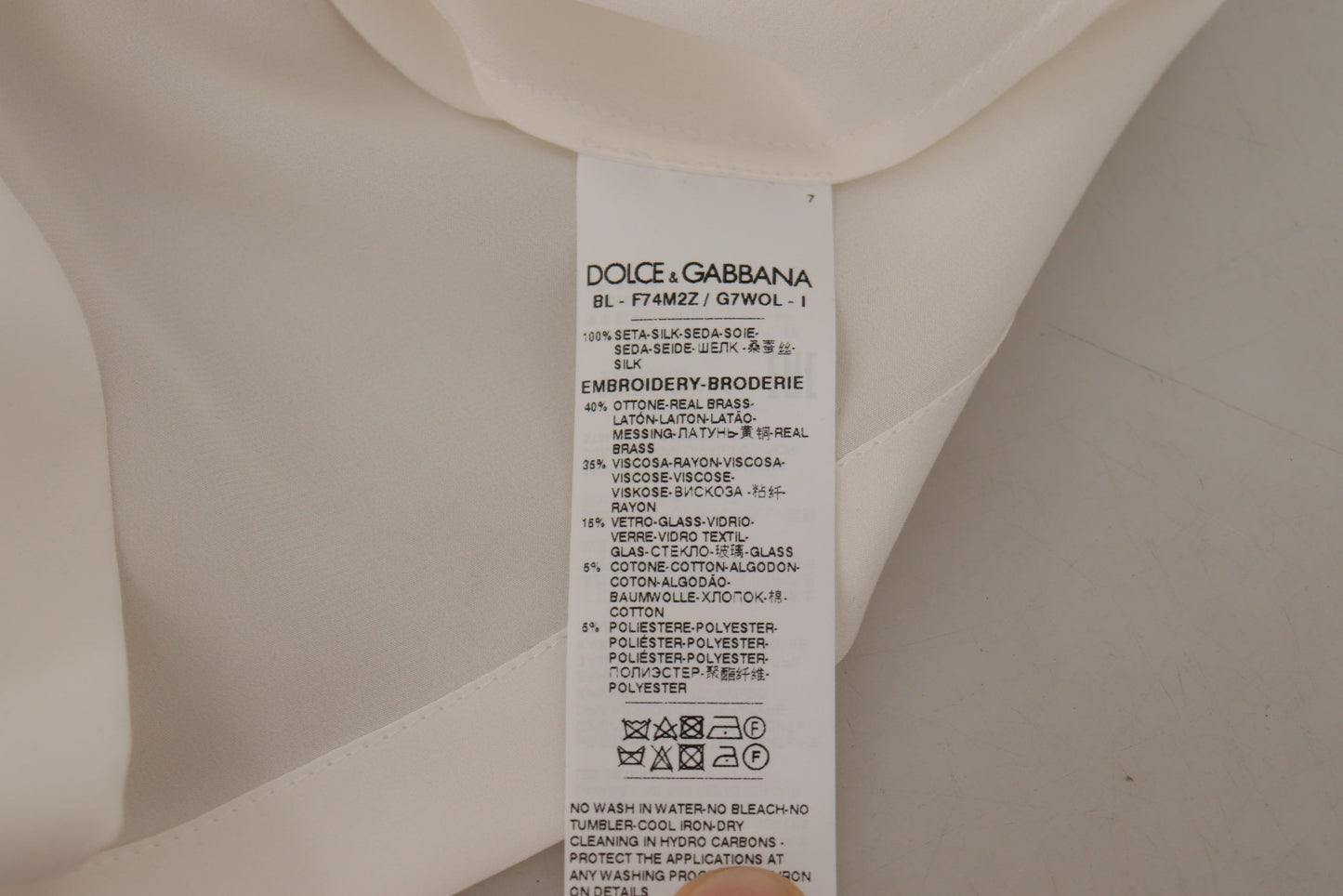 Dolce & Gabbana Blusentop aus weißer Seide mit goldener DG-Krone und Kristallen