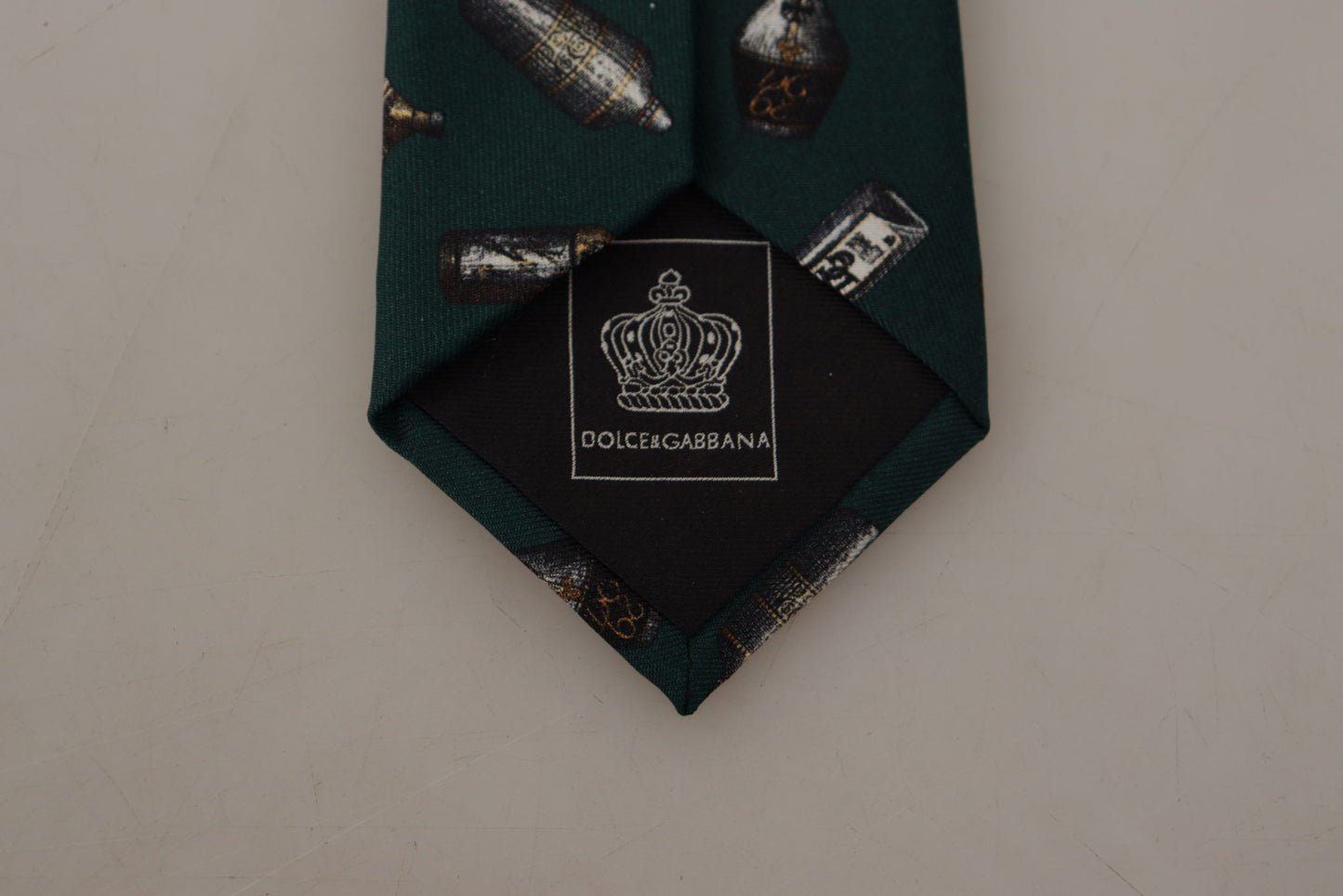 Dolce & Gabbana Schwarze Seidenkrawatte mit Fantasy-Print und verstellbarem Flaschenmotiv