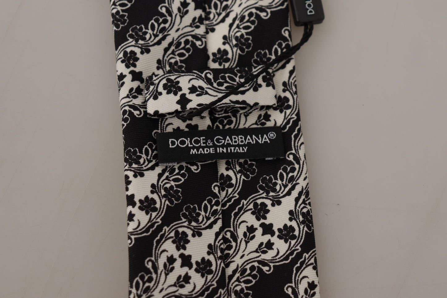 Dolce & Gabbana – Verstellbare Krawatte mit Blumenmuster aus 100 % Seide in Schwarz und Weiß