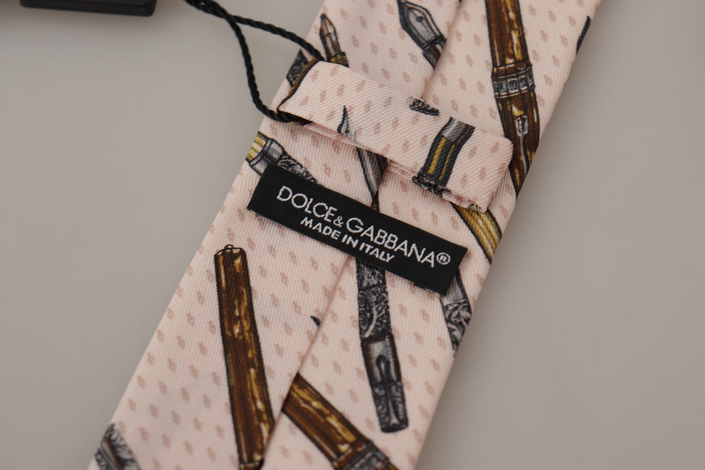 Dolce & Gabbana – Verstellbare Krawatte aus 100 % Seide mit rosa Stift- und Punktmuster