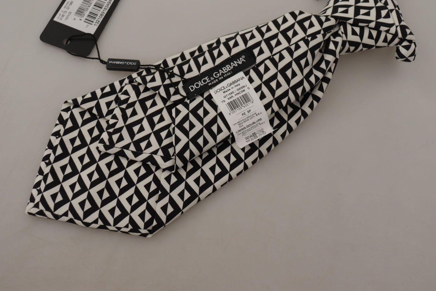 Dolce & Gabbana – Verstellbare Krawatte aus 100 % Seide in Schwarz und Weiß mit geometrischem Muster