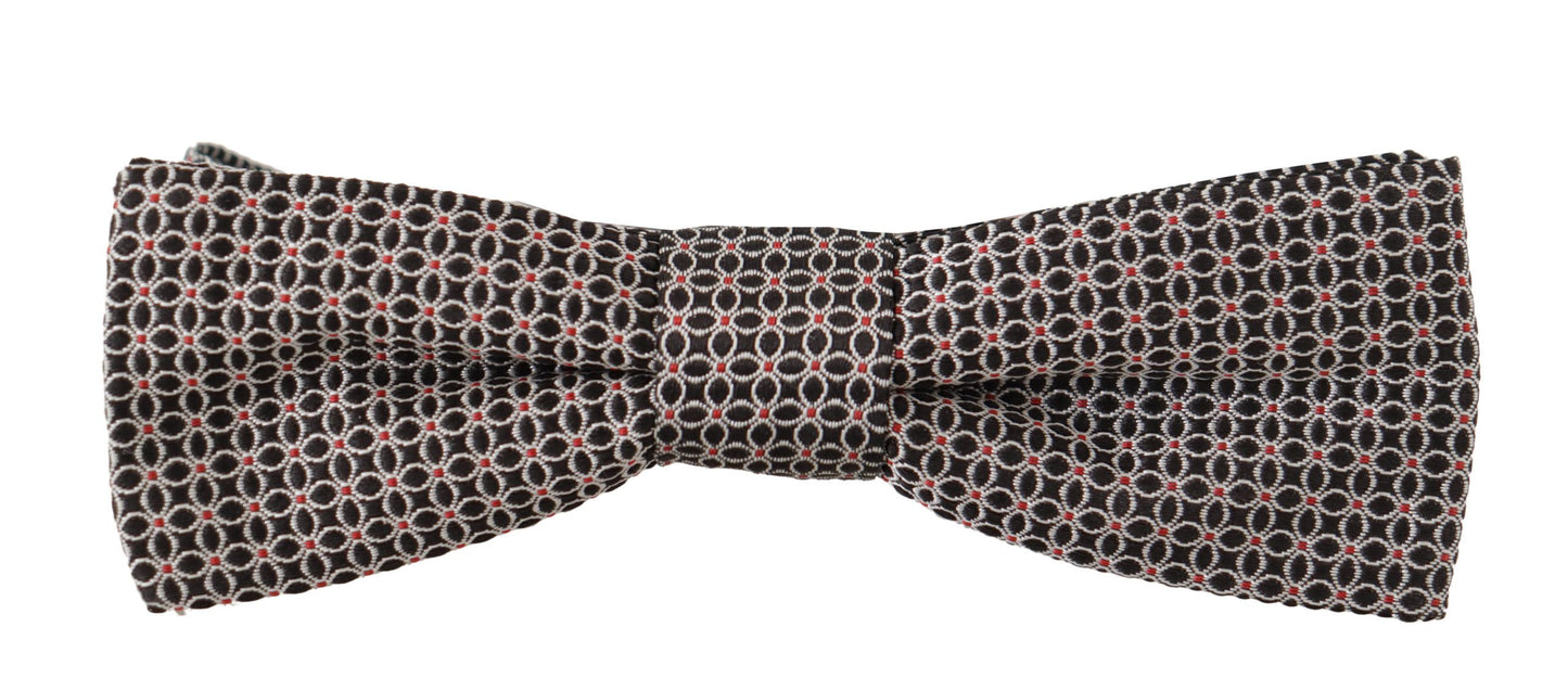 Dolce & Gabbana – Schwarz-weiße Seidenkrawatte mit Blumenmuster und Papillon-Muster