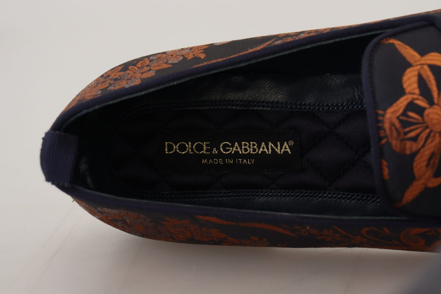 Dolce & Gabbana – Hausschuhe mit Blumenmuster in Blau und Rostrot