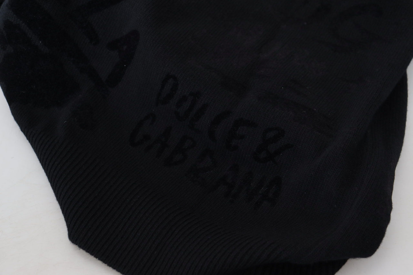 Dolce & Gabbana – Schwarzer Pullover mit Rundhalsausschnitt aus Wolle mit Logomuster