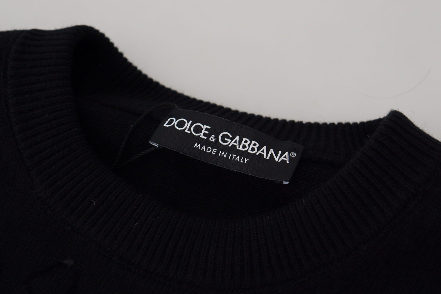Dolce & Gabbana – Schwarzer Pullover mit Rundhalsausschnitt aus Wolle mit Logomuster
