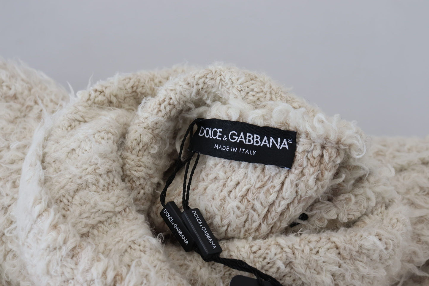 Dolce & Gabbana Cremefarbener Rollkragenpullover aus Wollstrick