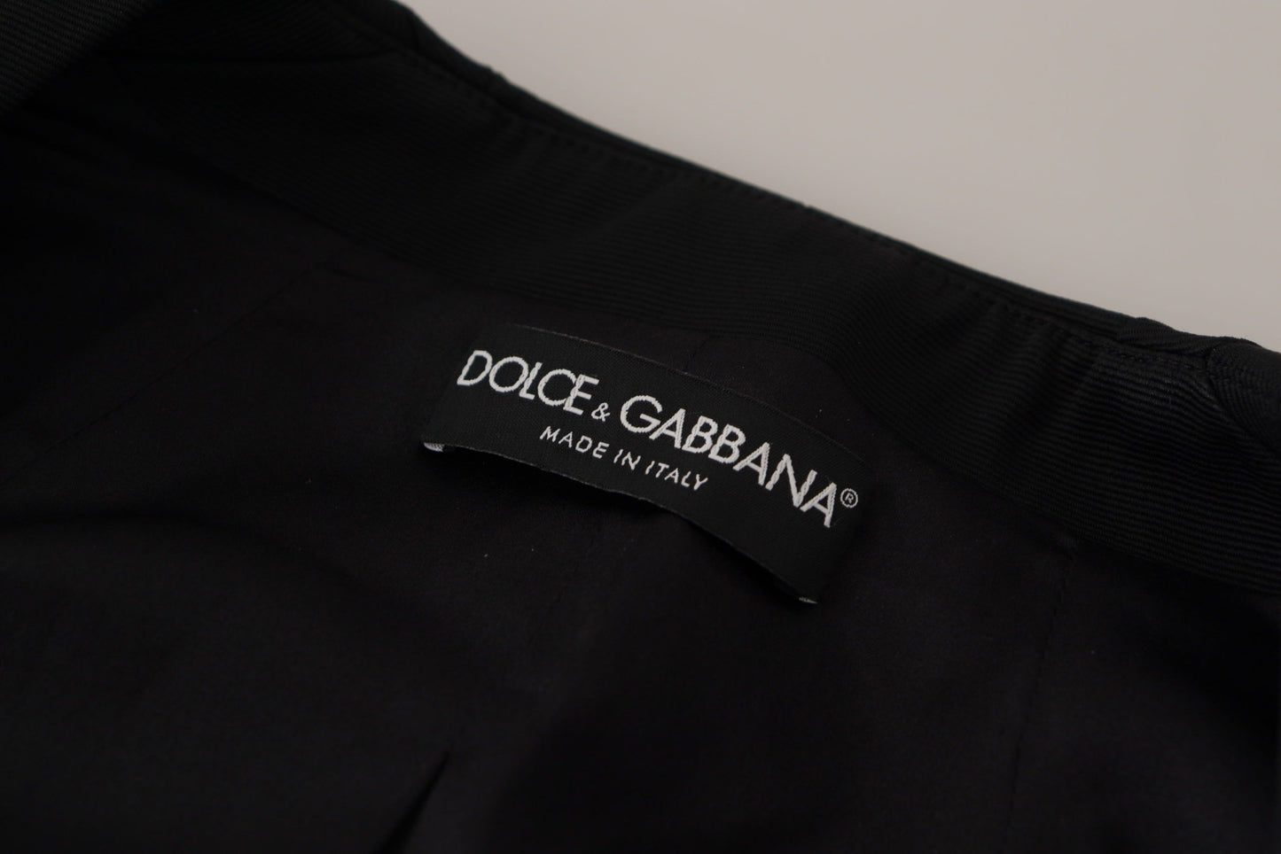 Dolce & Gabbana – Schwarze Slim Fit-Jacke mit langen Ärmeln und Druckknöpfen