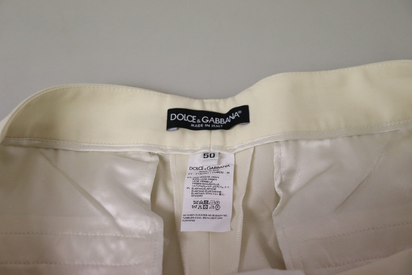 Dolce & Gabbana – Elfenbeinfarbene, hoch taillierte, verkürzte Hose mit umgeschlagenem Saum