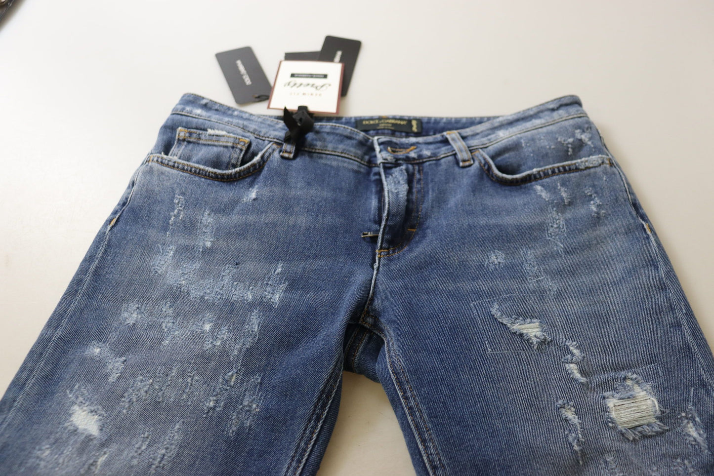 Dolce & Gabbana – Skinny-Jeans aus gewaschener Baumwolle mit niedriger Taille in Blau