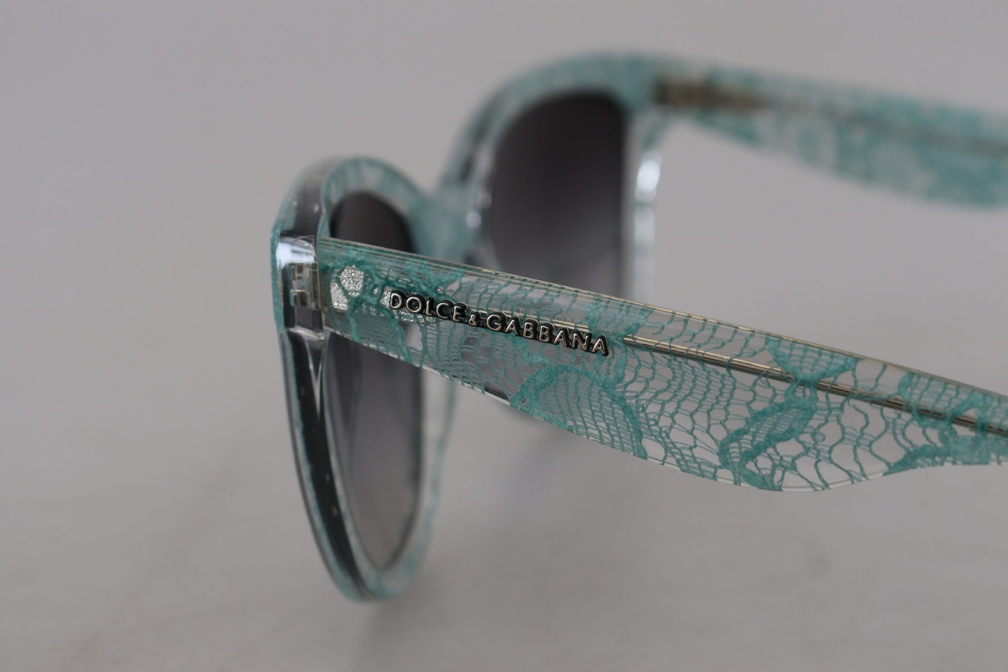 Dolce & Gabbana – Runde Sonnenbrille DG4190 aus Acetat mit blauer Spitze und Kristallen