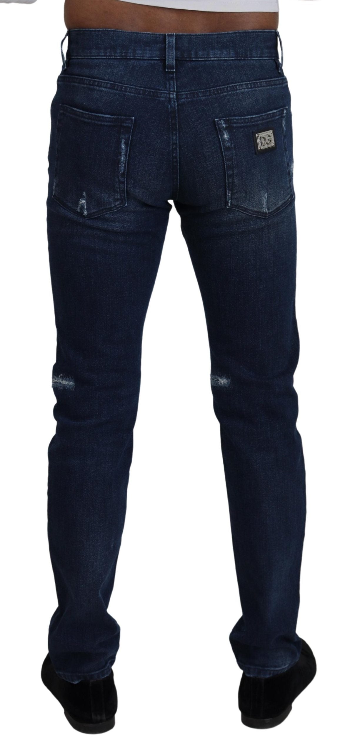 Dolce & Gabbana – Skinny-Jeans aus zerfetztem Baumwoll-Denim in Blau