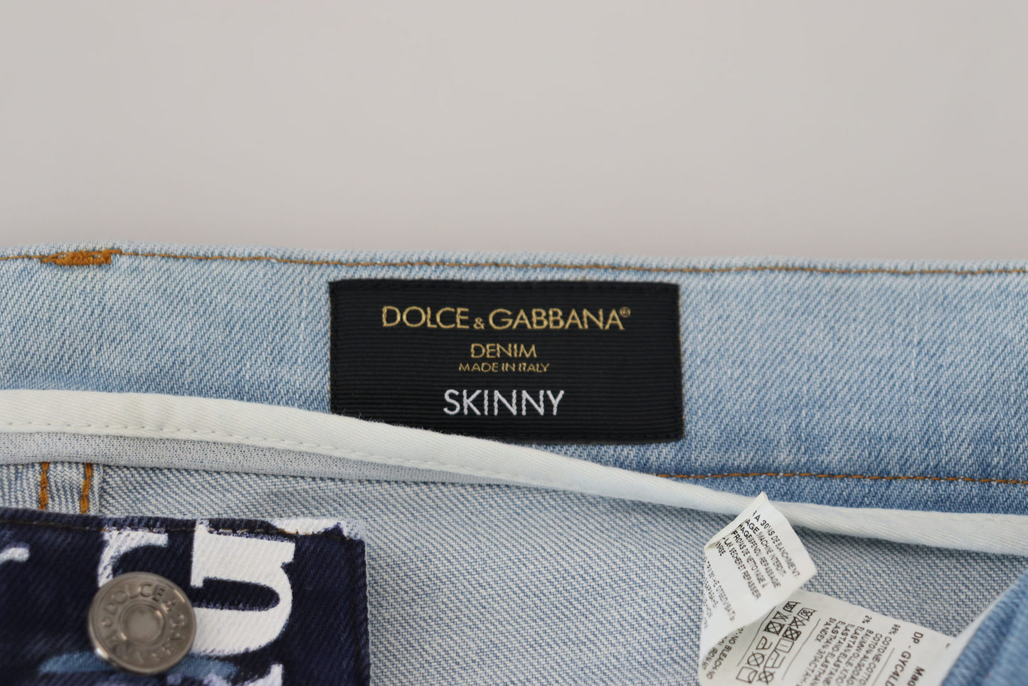 Dolce & Gabbana – Blaue Skinny-Jeans aus Baumwolle mit Kronen-Print