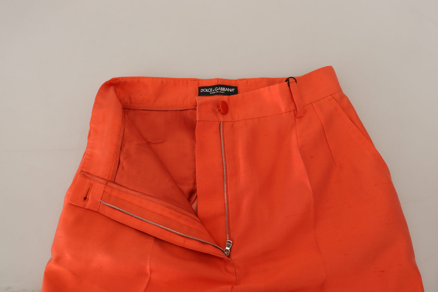 Dolce & Gabbana – Orangefarbene, verkürzte Hose aus Seide mit hoher Taille
