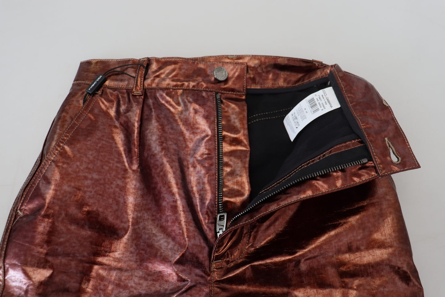 Dolce & Gabbana – Enge Jeans mit hoher Taille in Metallic-Bronze