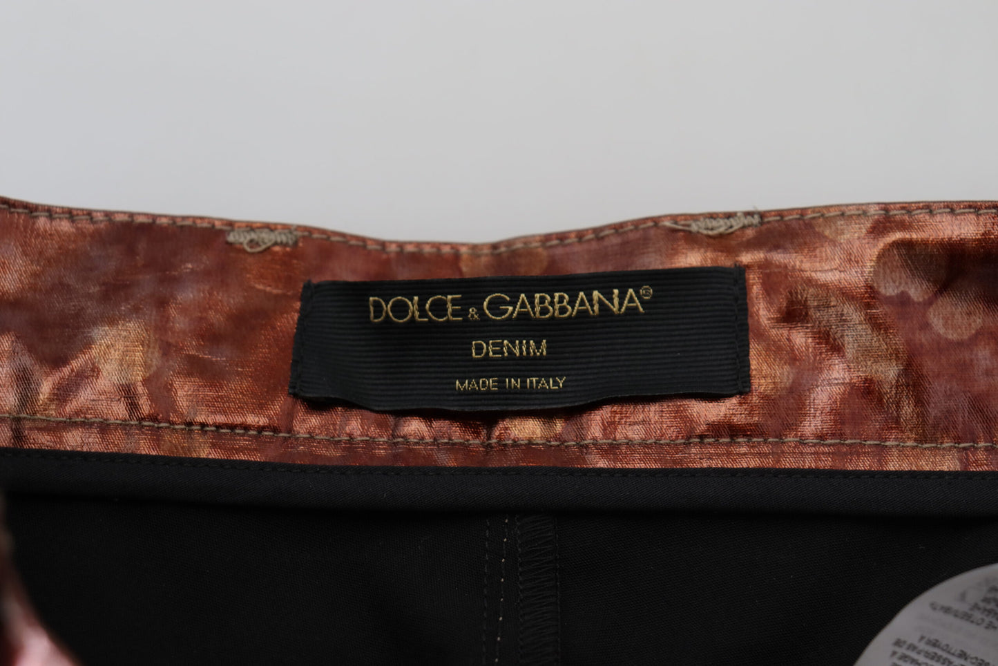 Dolce & Gabbana – Enge Jeans mit hoher Taille in Metallic-Bronze