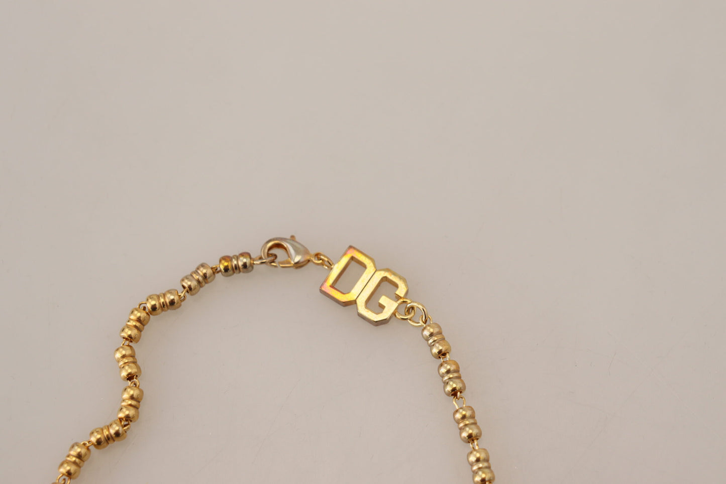 Dolce & Gabbana – Halskette mit Logo und Anhänger „Super Pig“ aus goldenem Messing