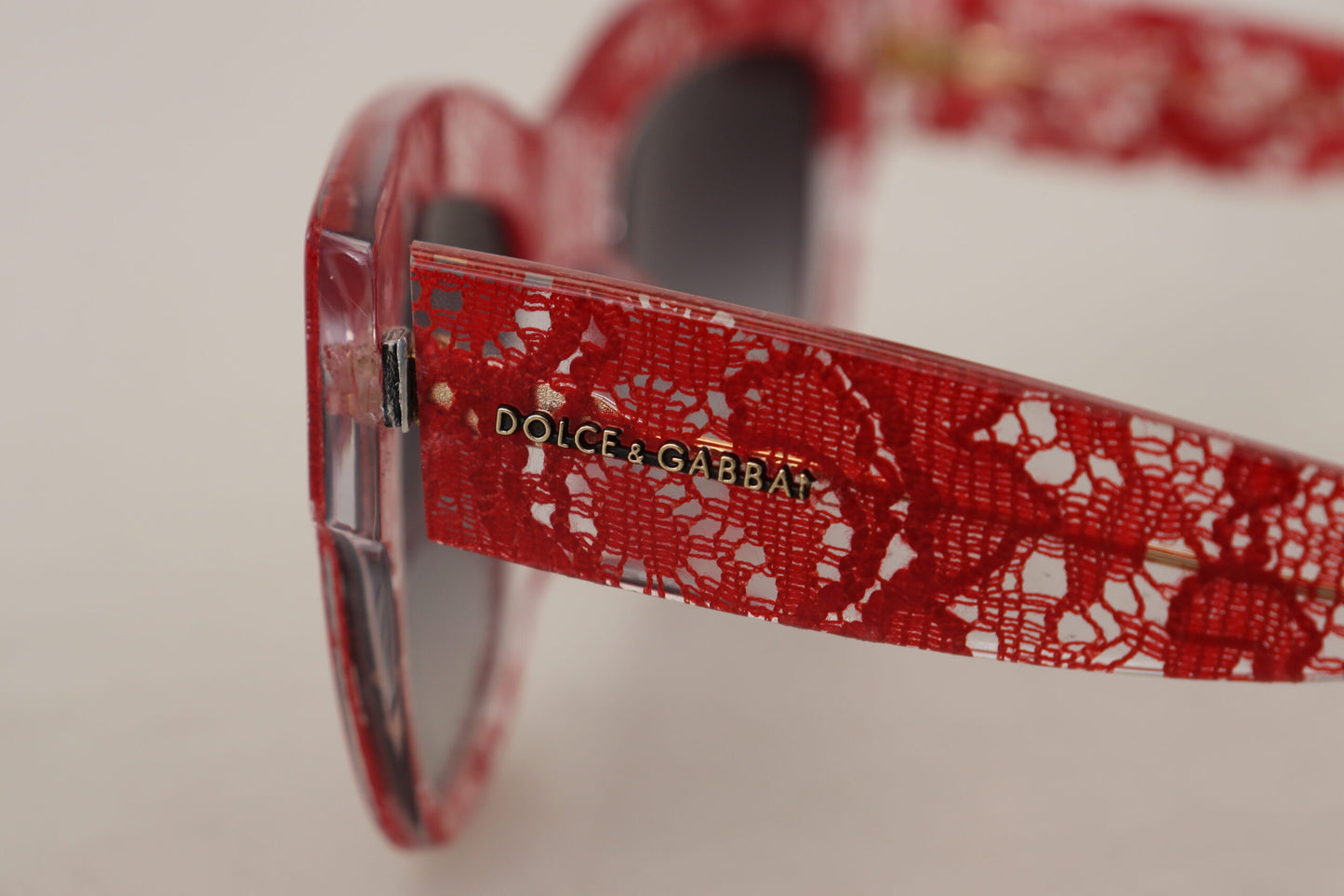 Dolce & Gabbana – Rote Sonnenbrille mit rechteckigem Acetat-Spitzenrahmen DG4231F
