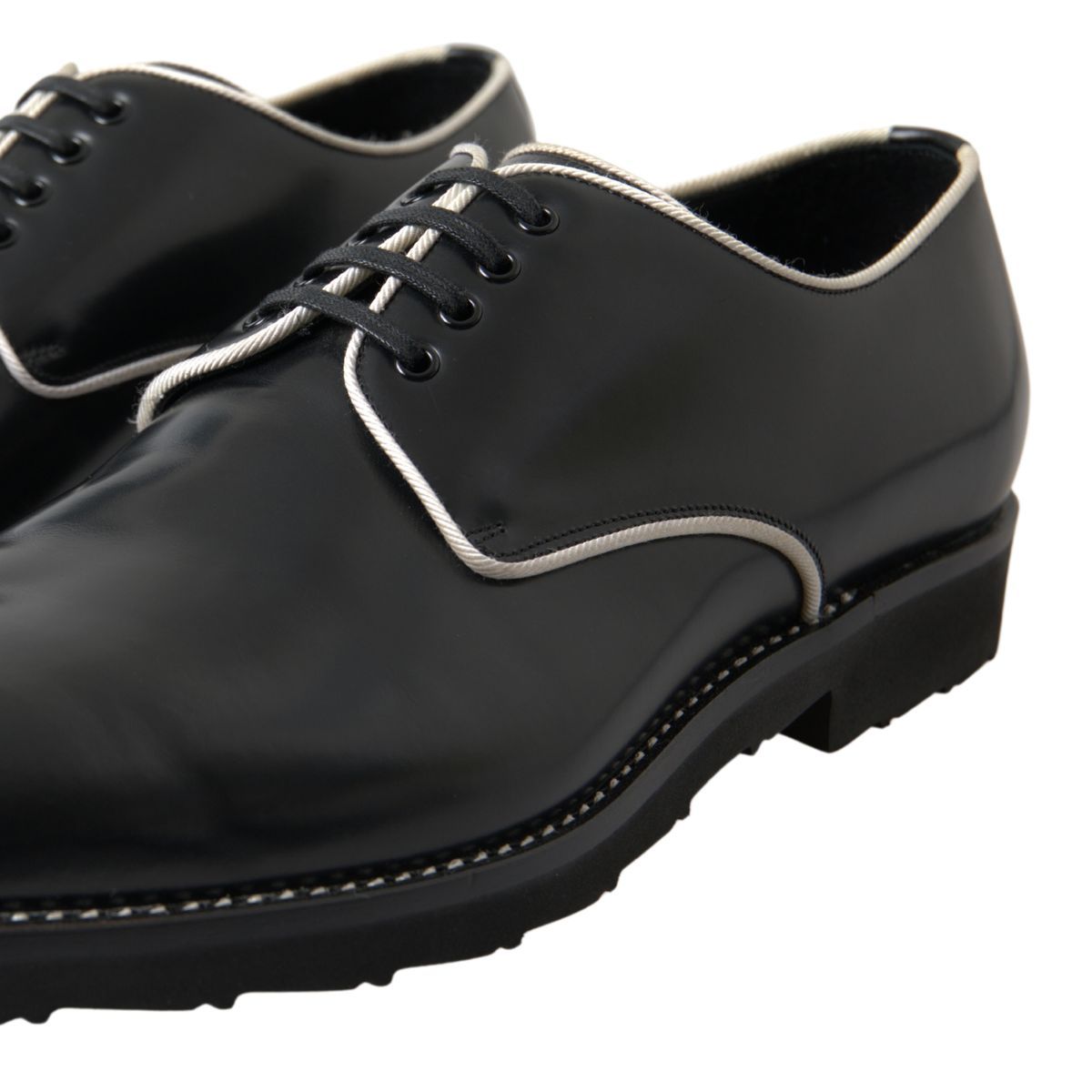 Dolce & Gabbana – Formelle Schuhe aus schwarzem und weißem Leder