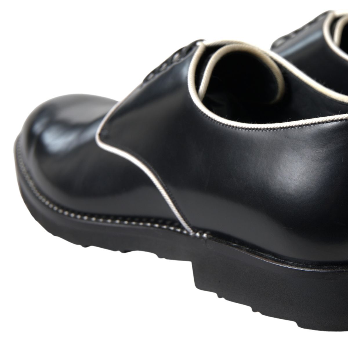Dolce & Gabbana – Formelle Schuhe aus schwarzem und weißem Leder