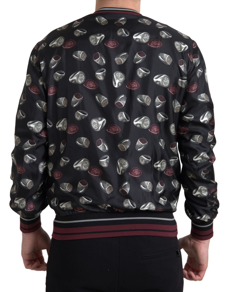 Dolce & Gabbana – Schwarzer Seidenpullover mit Rundhalsausschnitt und Ringprint