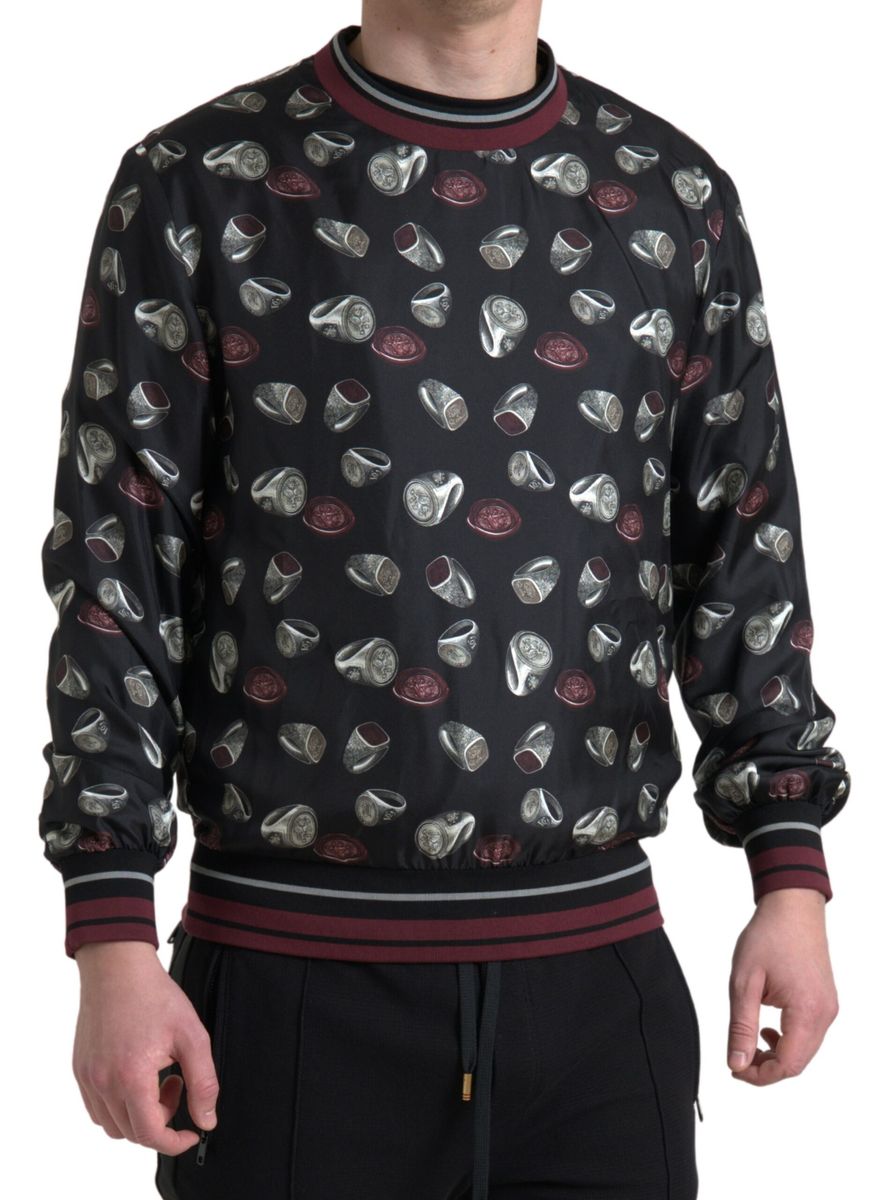 Dolce & Gabbana – Schwarzer Seidenpullover mit Rundhalsausschnitt und Ringprint