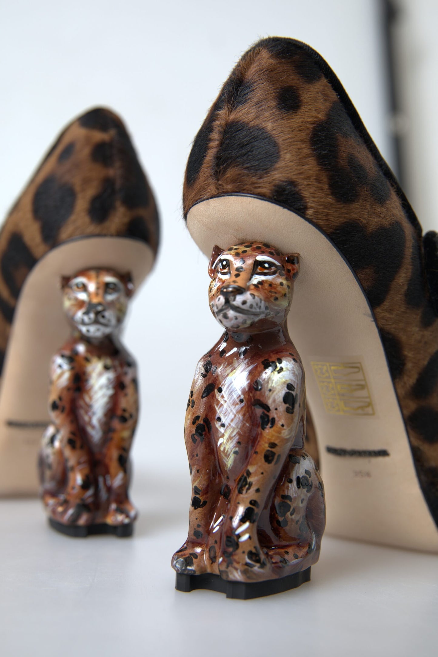 Dolce & Gabbana – Mary-Jane-Pumps mit Leopardenmuster in Schwarz und Braun