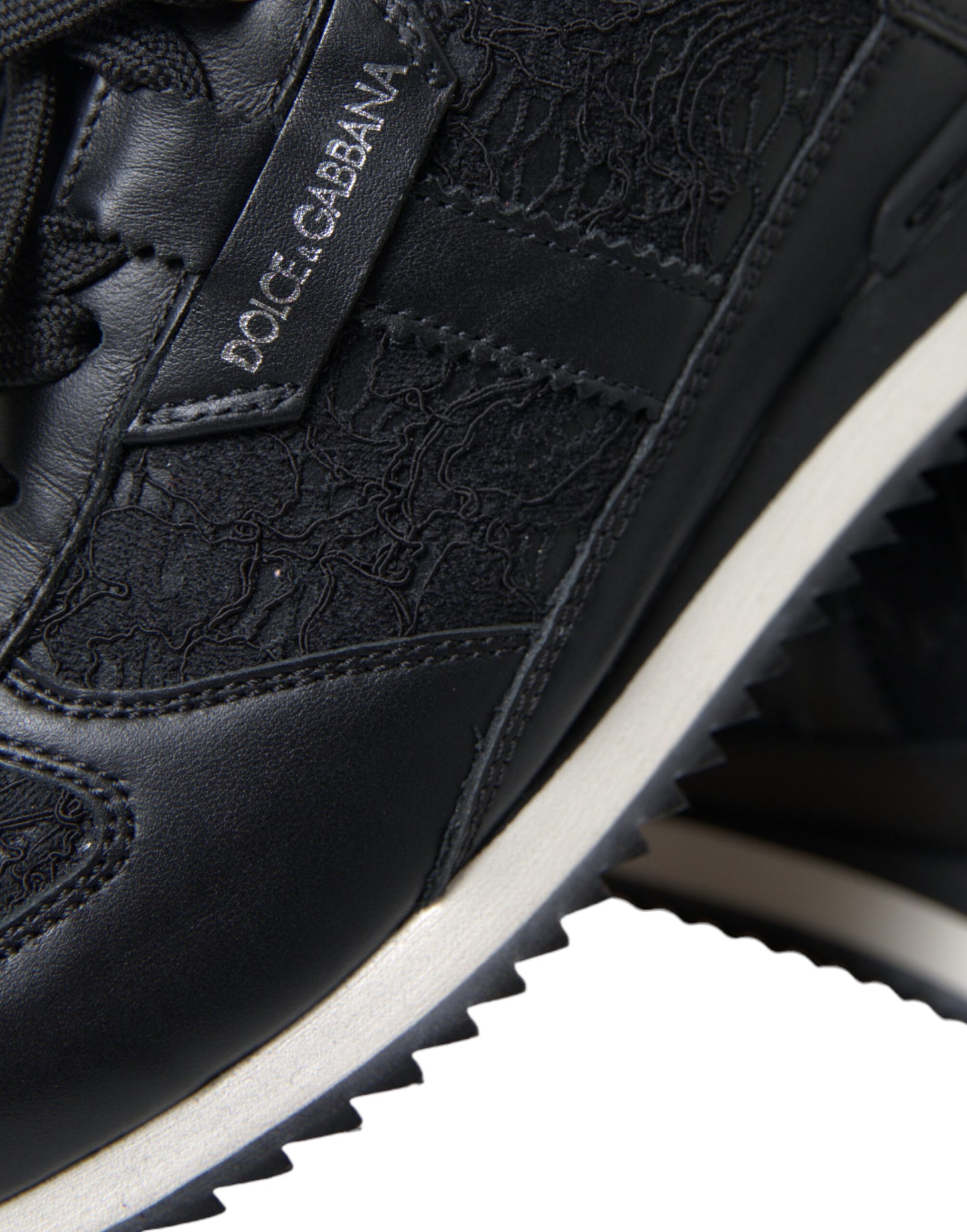 Dolce & Gabbana Schwarze Sneakers aus Leder mit Blumenspitze