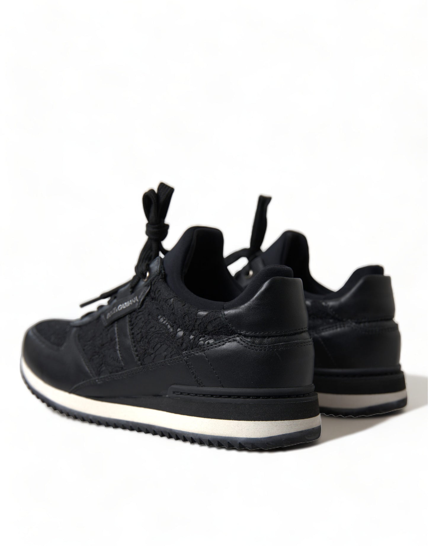 Dolce & Gabbana Schwarze Sneakers aus Leder mit Blumenspitze