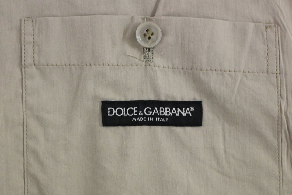 Dolce & Gabbana – Schmal geschnittene Weste aus Baumwolle in Beige mit Knopfleiste vorne