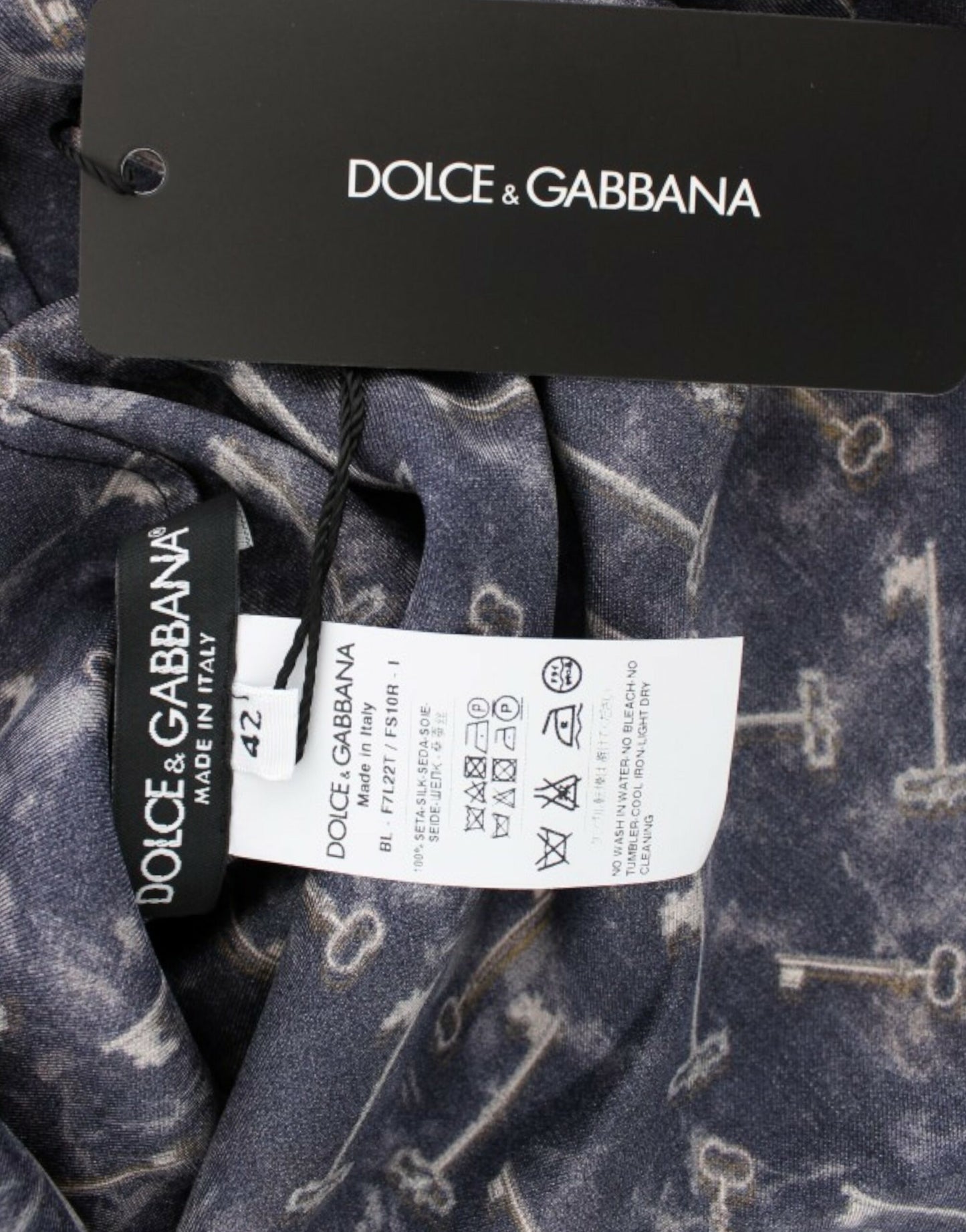 Dolce & Gabbana Blaue Seidenbluse mit goldenem Schlüsseldruck