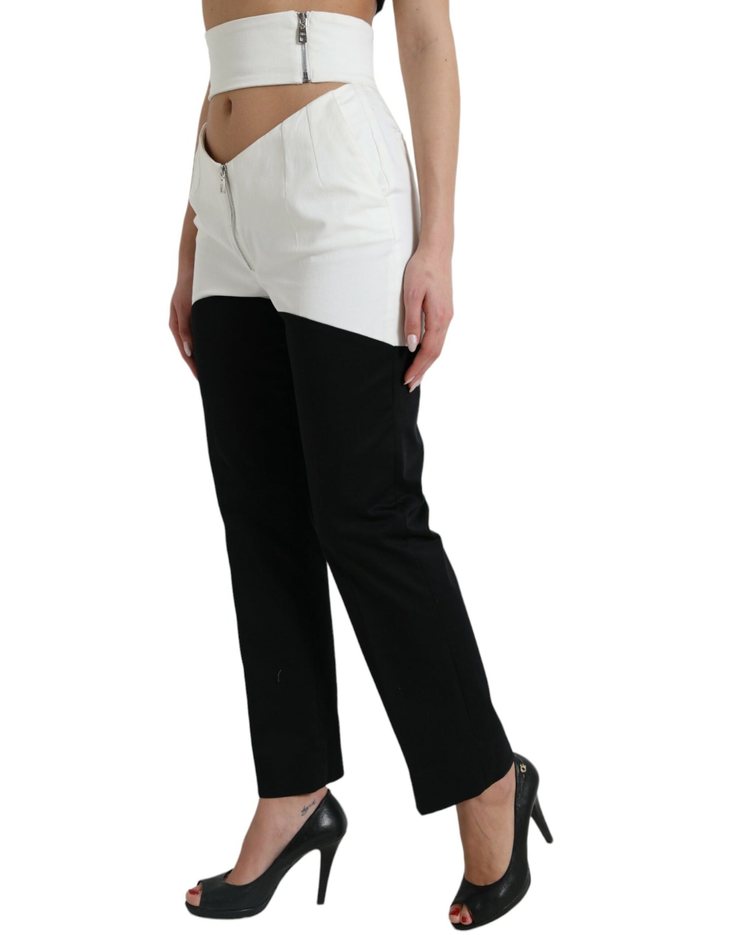 Dolce & Gabbana – Schmal zulaufende Hose aus Baumwolle in Schwarz und Weiß mit Cut-Out-Taille