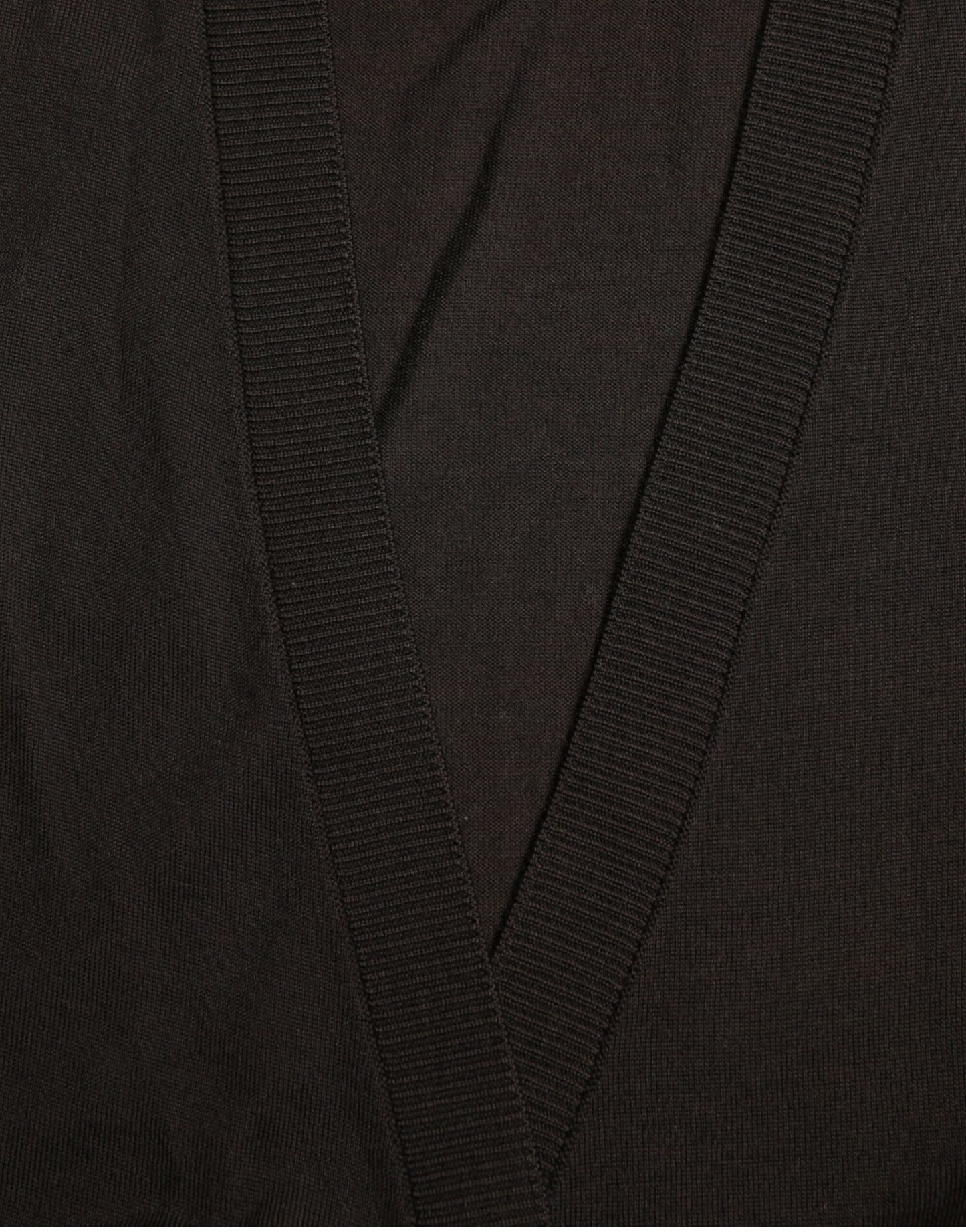 Dolce & Gabbana – Schwarzer Cardigan aus Wolle mit V-Ausschnitt und gekreuztem Saum