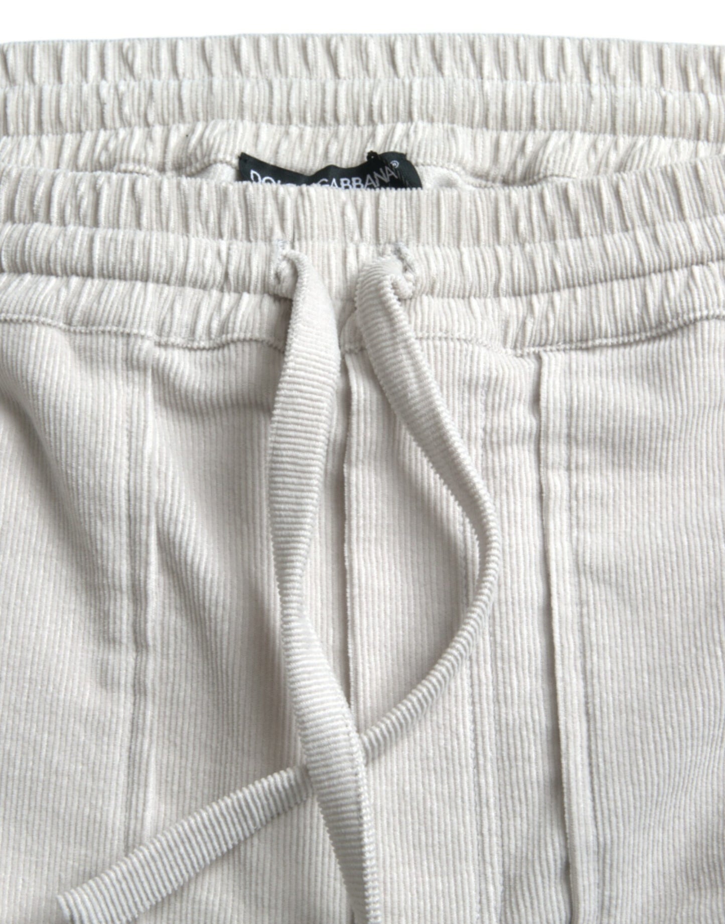 Dolce & Gabbana – Beigefarbene Bermudashorts aus Baumwollcord mit Logo