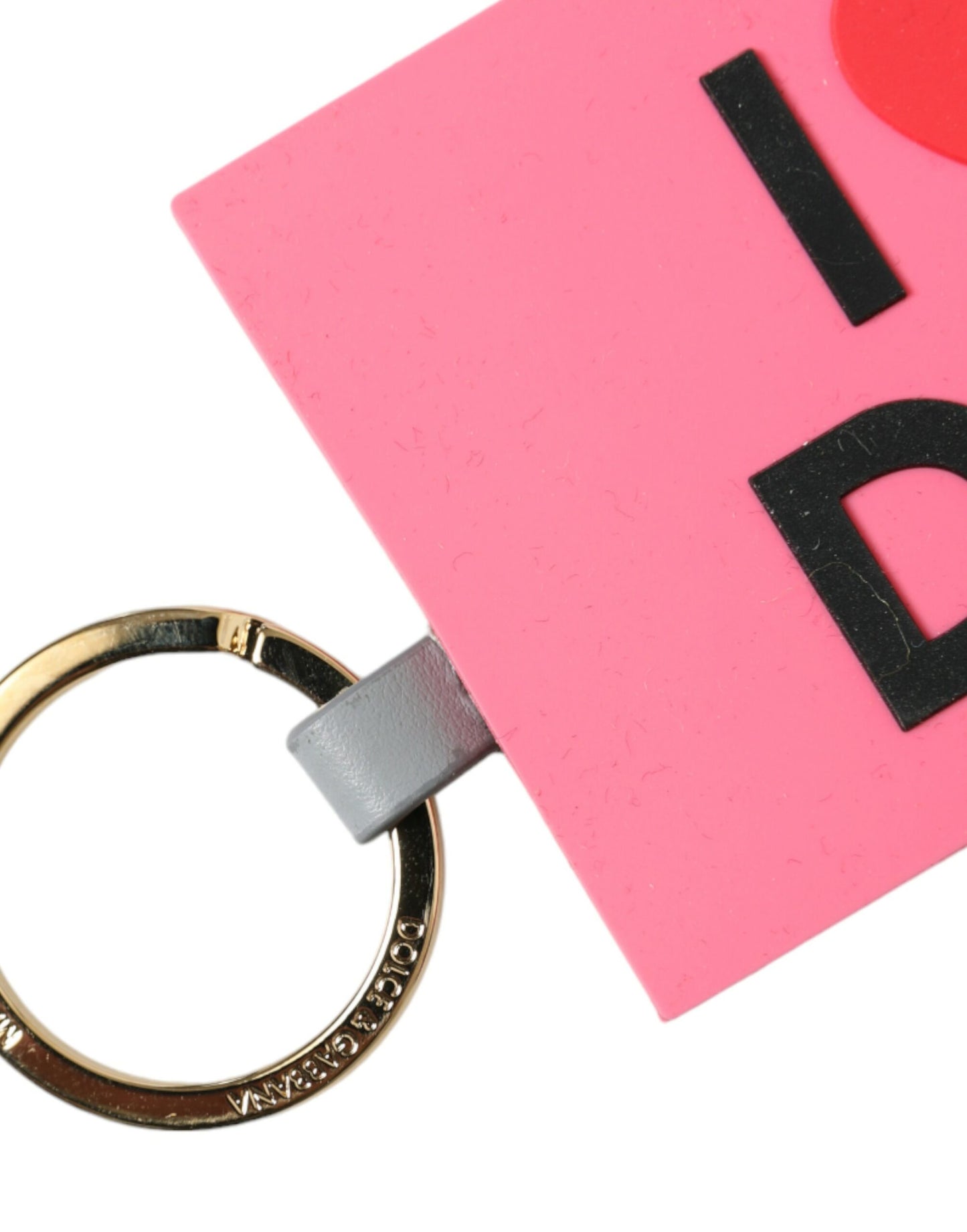 Dolce & Gabbana Schlüsselanhänger aus rosa Silikon mit DG-Logo und goldenem Messing