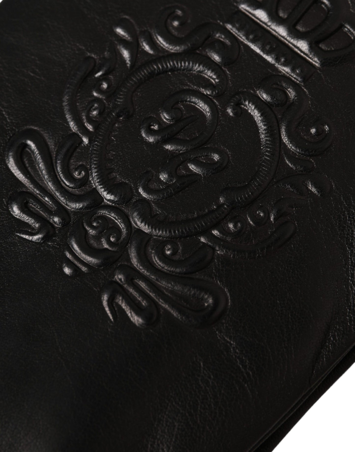 Dolce & Gabbana – Kurze Handschuhe aus schwarzem Leder mit geprägtem Logo