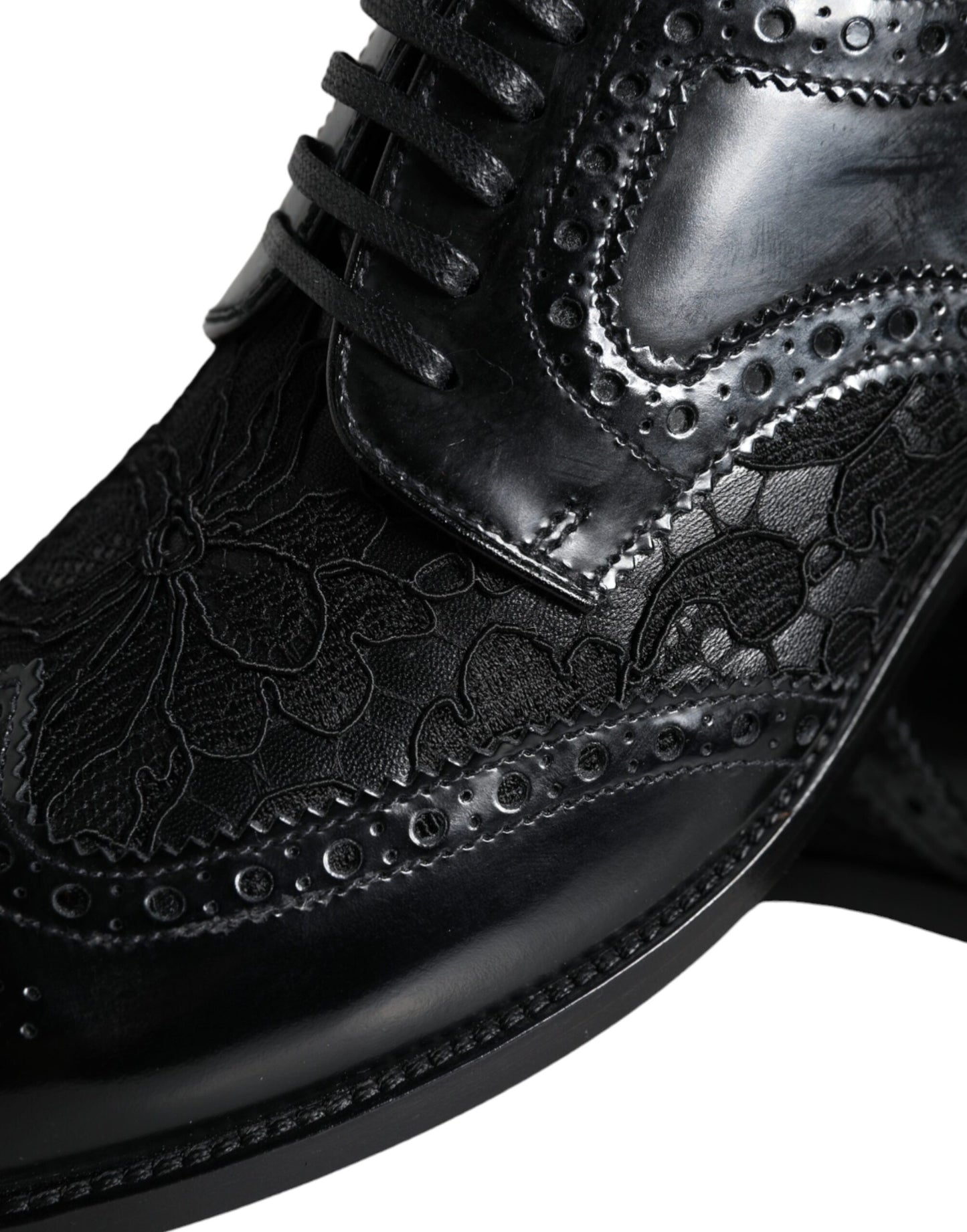 Dolce & Gabbana – Formelle Schuhe aus schwarzem Leder mit floraler Spitze