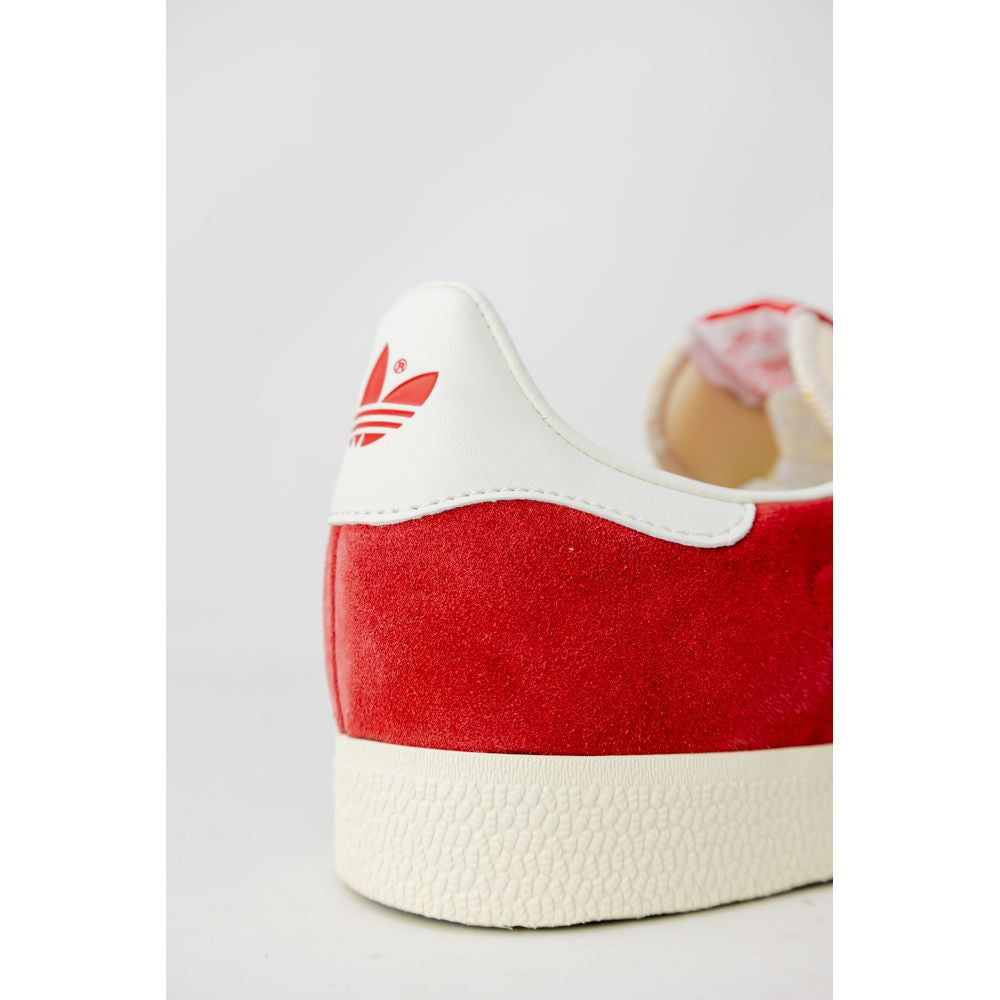 Adidas – Orangefarbene Wildleder-Sneaker