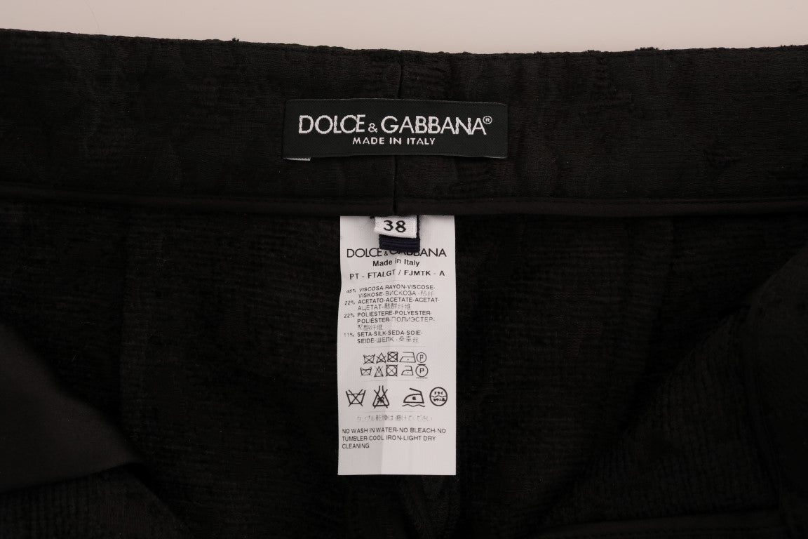 Dolce & Gabbana – Schwarze Caprihose aus geblümtem Brokat