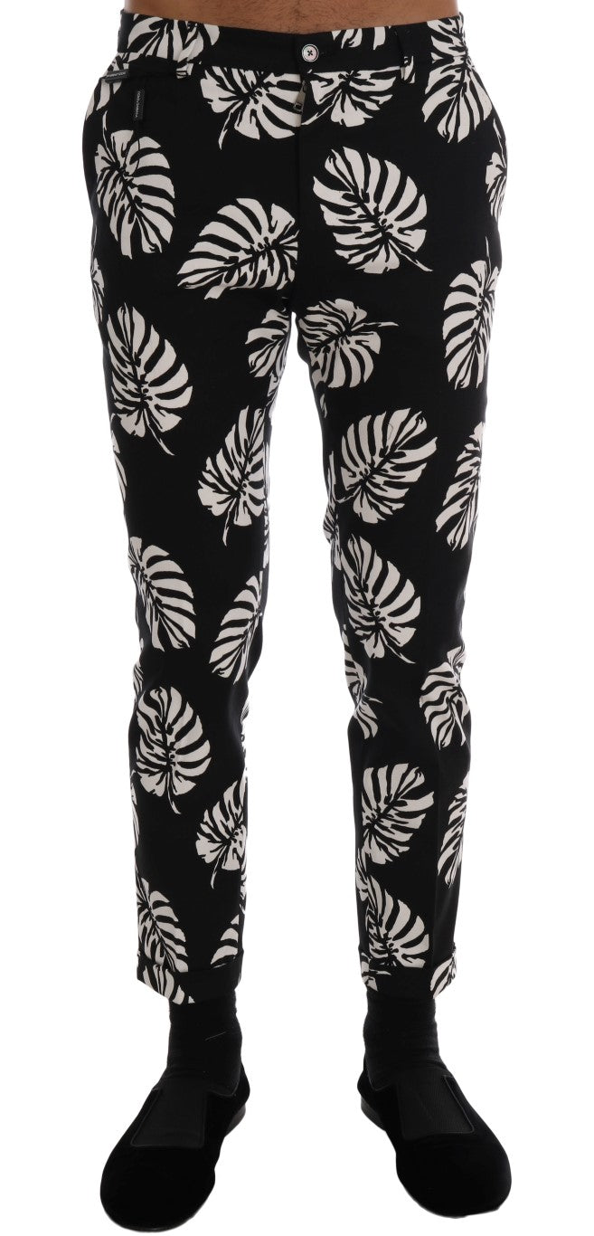 Dolce & Gabbana – Schmale Hose aus Baumwollstretch in Weiß und Schwarz mit Blattmuster