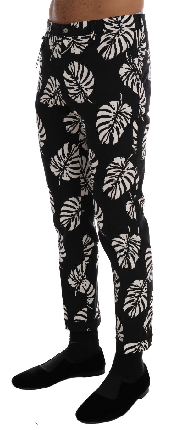 Dolce & Gabbana – Schmale Hose aus Baumwollstretch in Weiß und Schwarz mit Blattmuster