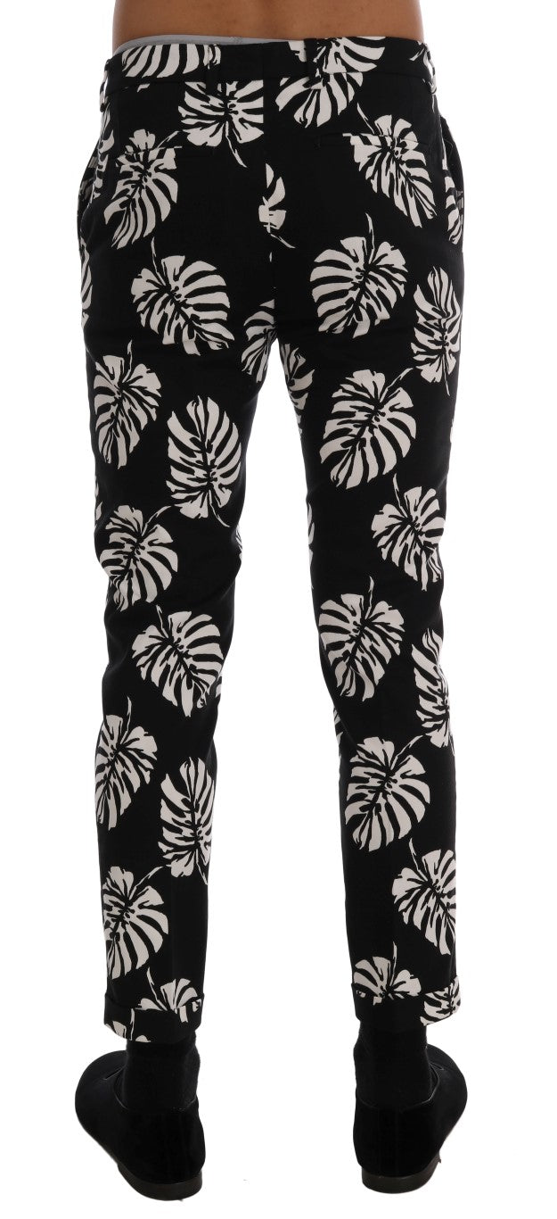 Dolce & Gabbana – Schmale Hose aus Baumwollstretch in Weiß und Schwarz mit Blattmuster