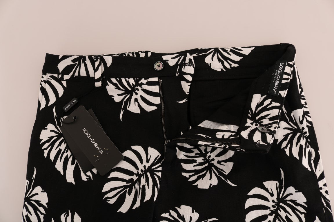 Dolce & Gabbana – Schmale Hose aus Baumwollstretch in Weiß und Schwarz mit Blattmuster
