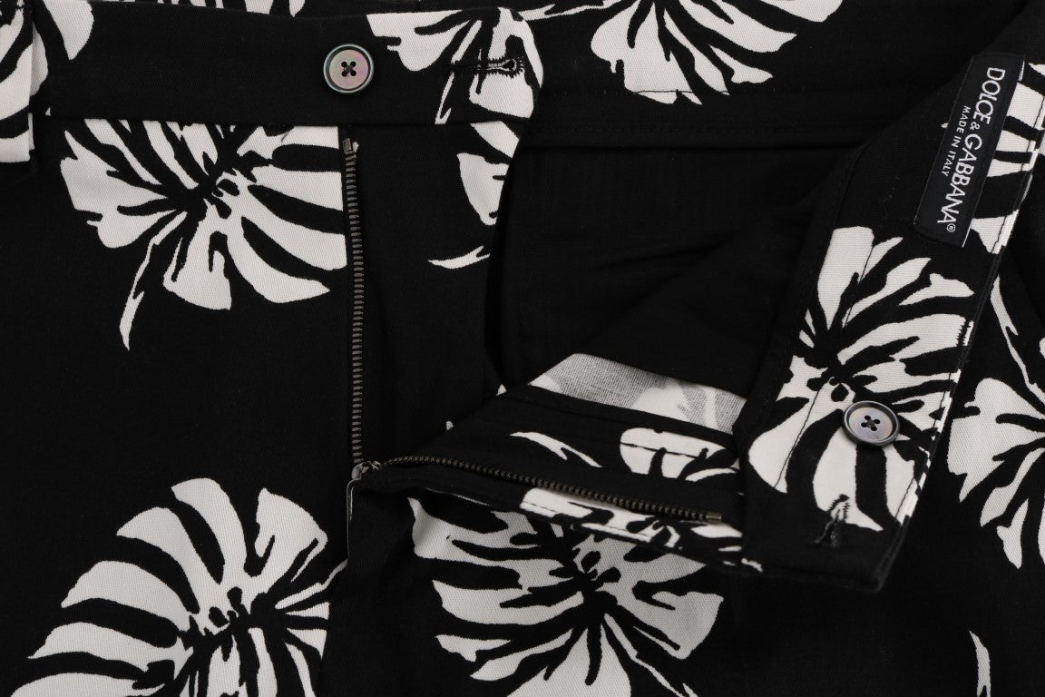 Dolce & Gabbana – Schmale Hose aus Baumwollstretch in Weiß und Schwarz mit Blattmuster