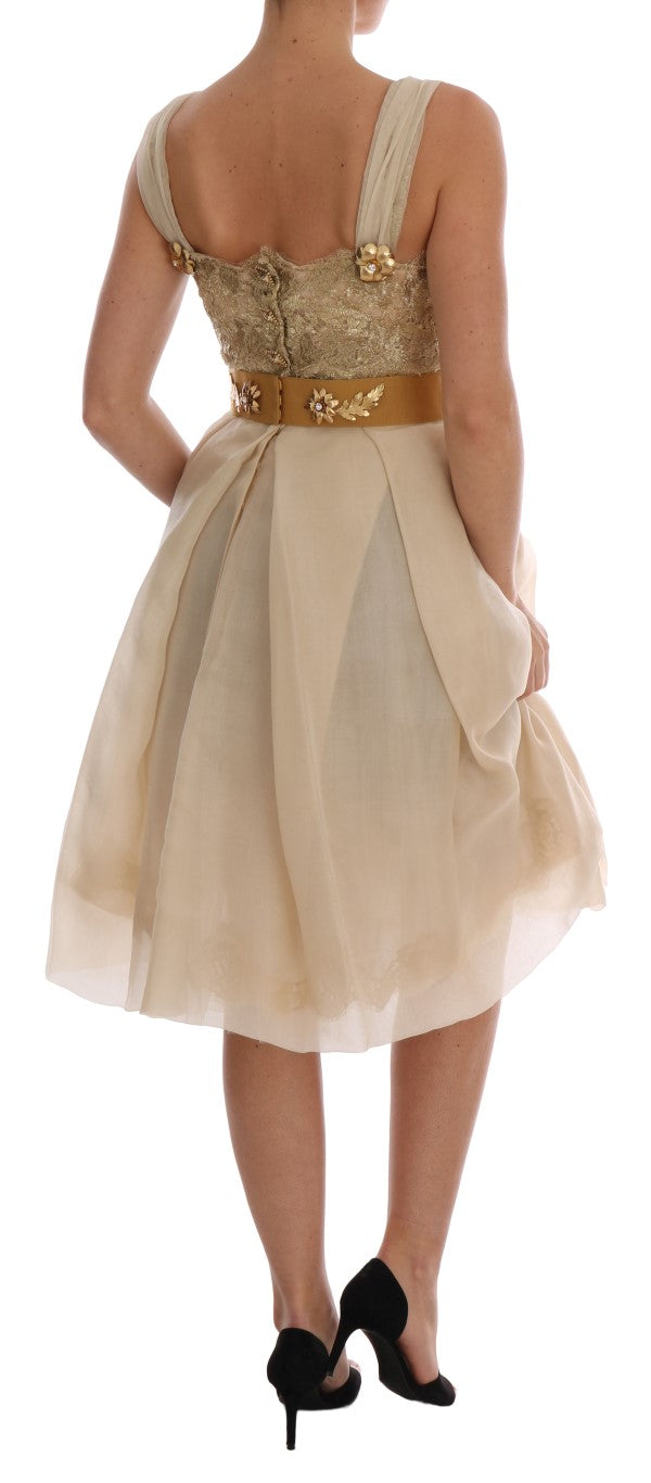 Dolce & Gabbana – Kleid aus goldener Seide mit Kristallverzierung