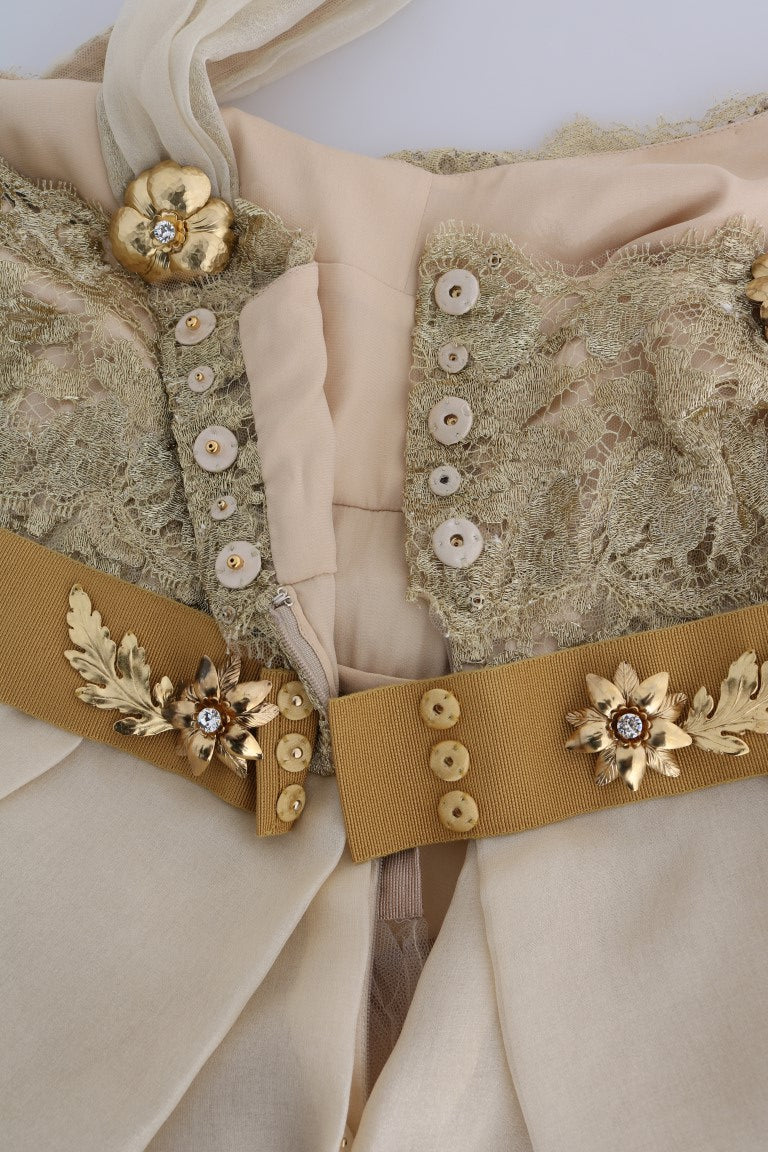 Dolce & Gabbana – Kleid aus goldener Seide mit Kristallverzierung