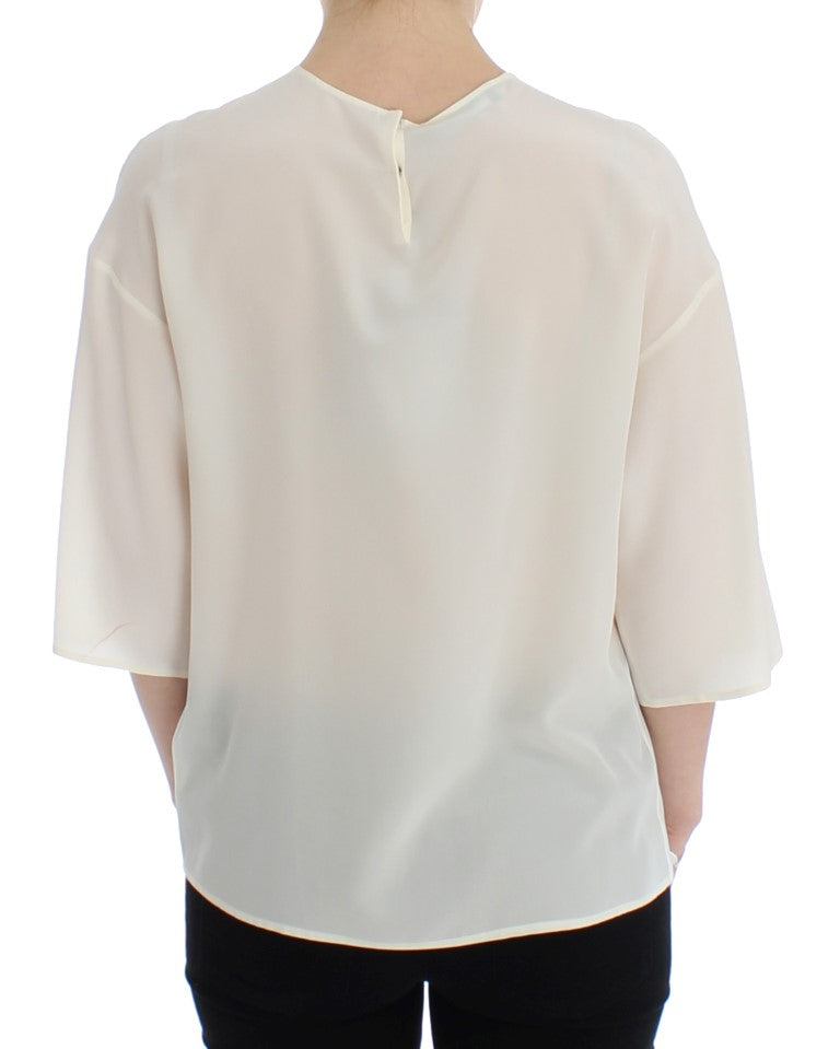Dolce & Gabbana – Weiße Seidenbluse mit Pailletten und Schlüsseldesign, T-Shirt-Oberteil