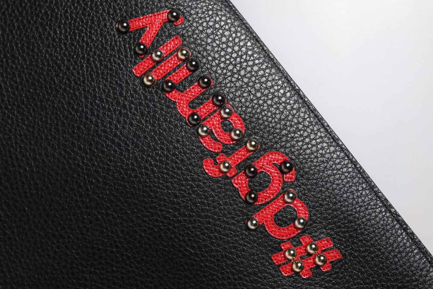 Dolce & Gabbana – Schwarze Clutch aus verziertem Leder #DGFamily