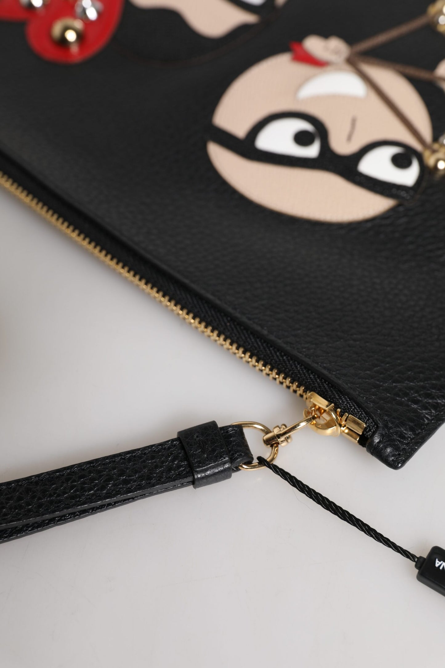 Dolce & Gabbana – Schwarze Clutch aus verziertem Leder #DGFamily